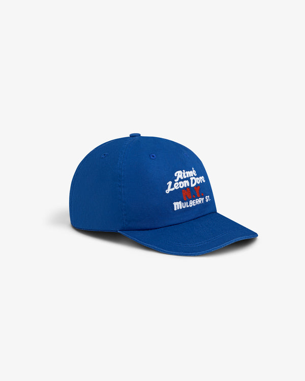 Mulberry Chainstitch Hat: Blue cap with white “Aimé Leon Dore MULBERRY ST.” text and a small red heart on front.