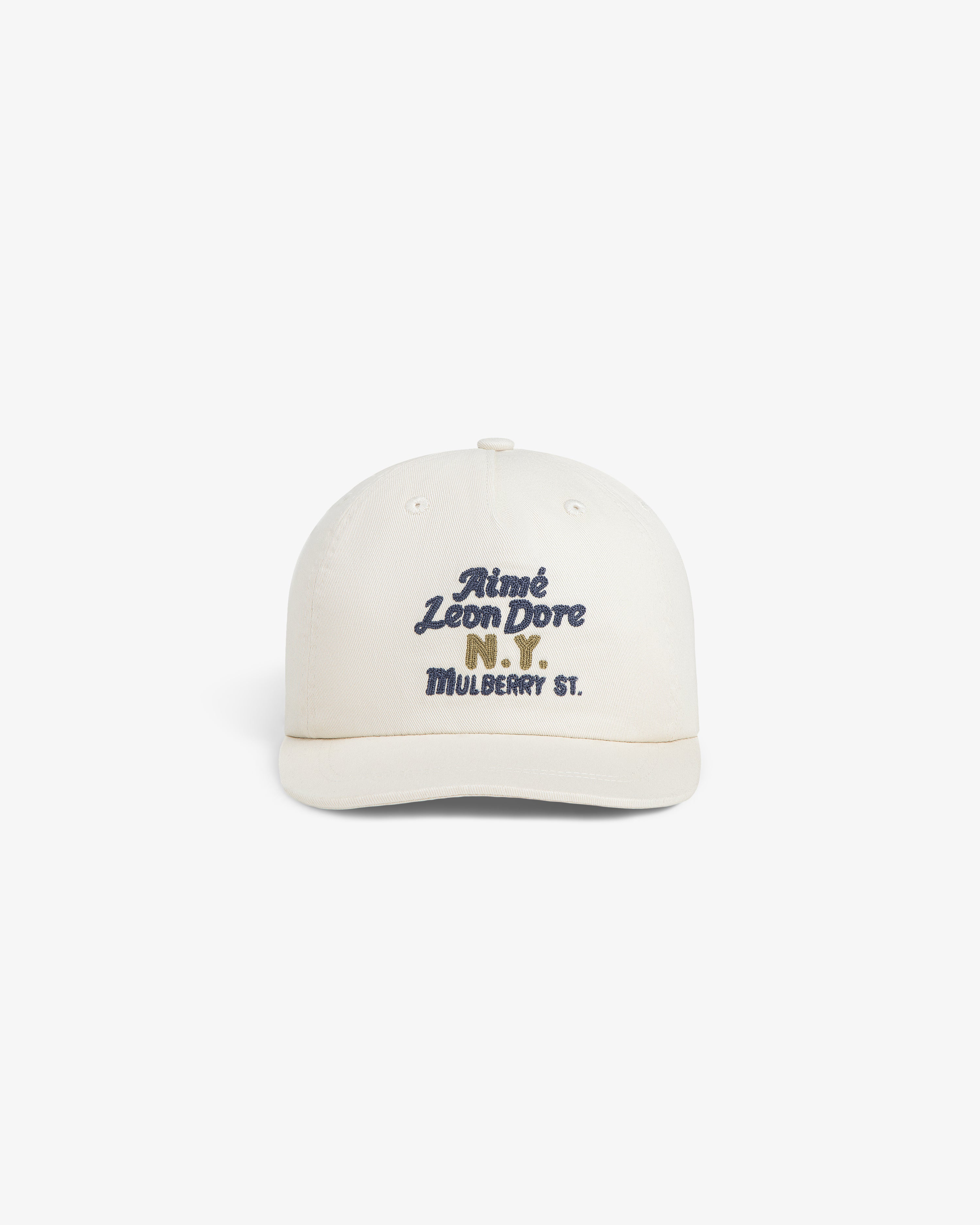 Cream Mulberry Chainstitch Hat with blue “Aimé Leon Dore N.Y. MULBERRY ST.” text on the front.