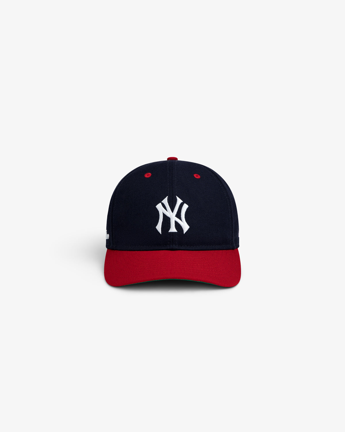 ALD / New Era Yankees Retro Fit Hat in navy with a red brim and white Yankees logo on the front.