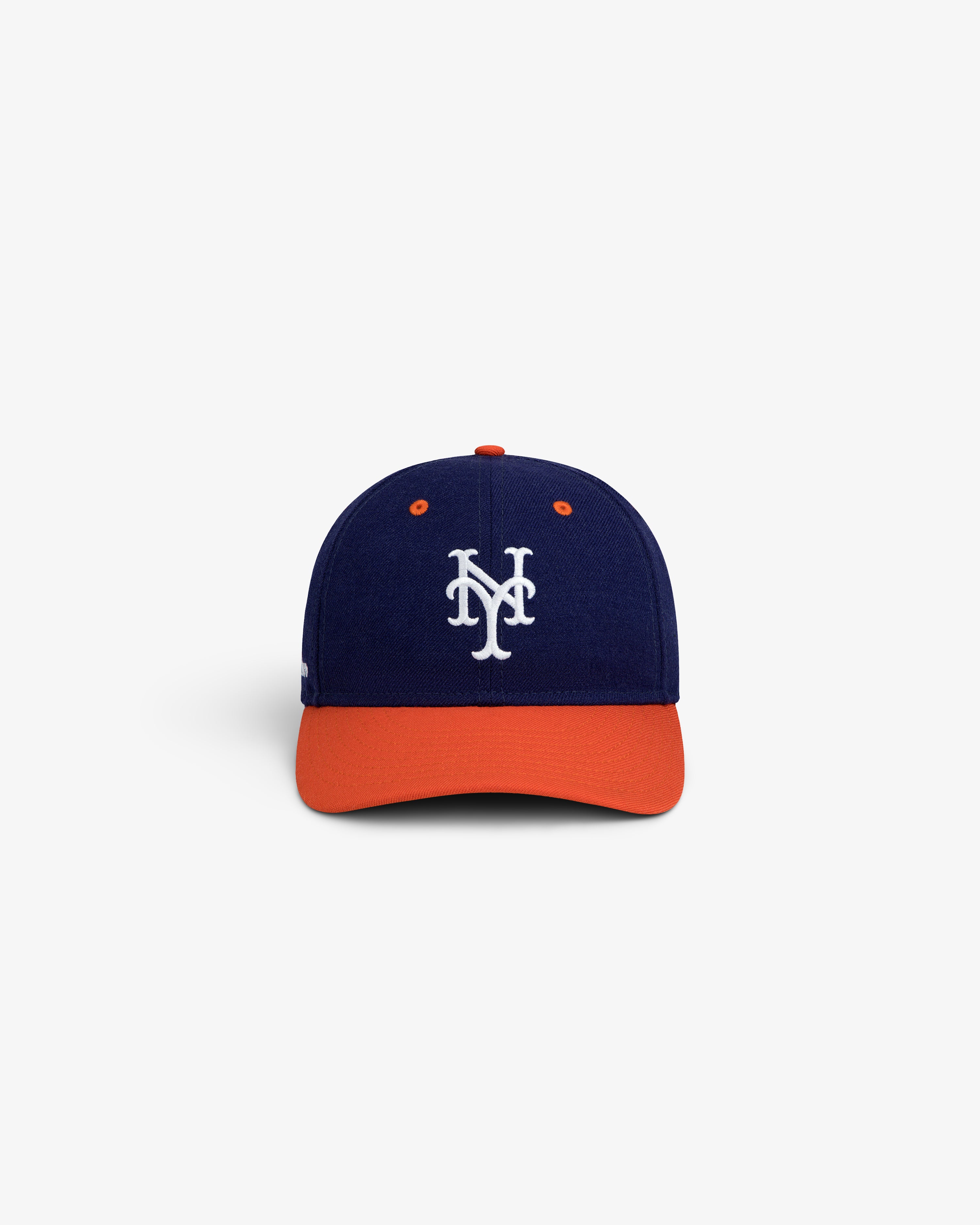 ALD / New Era Mets Retro Fit Hat: a navy blue baseball cap with an orange brim and a white NY logo on the front.