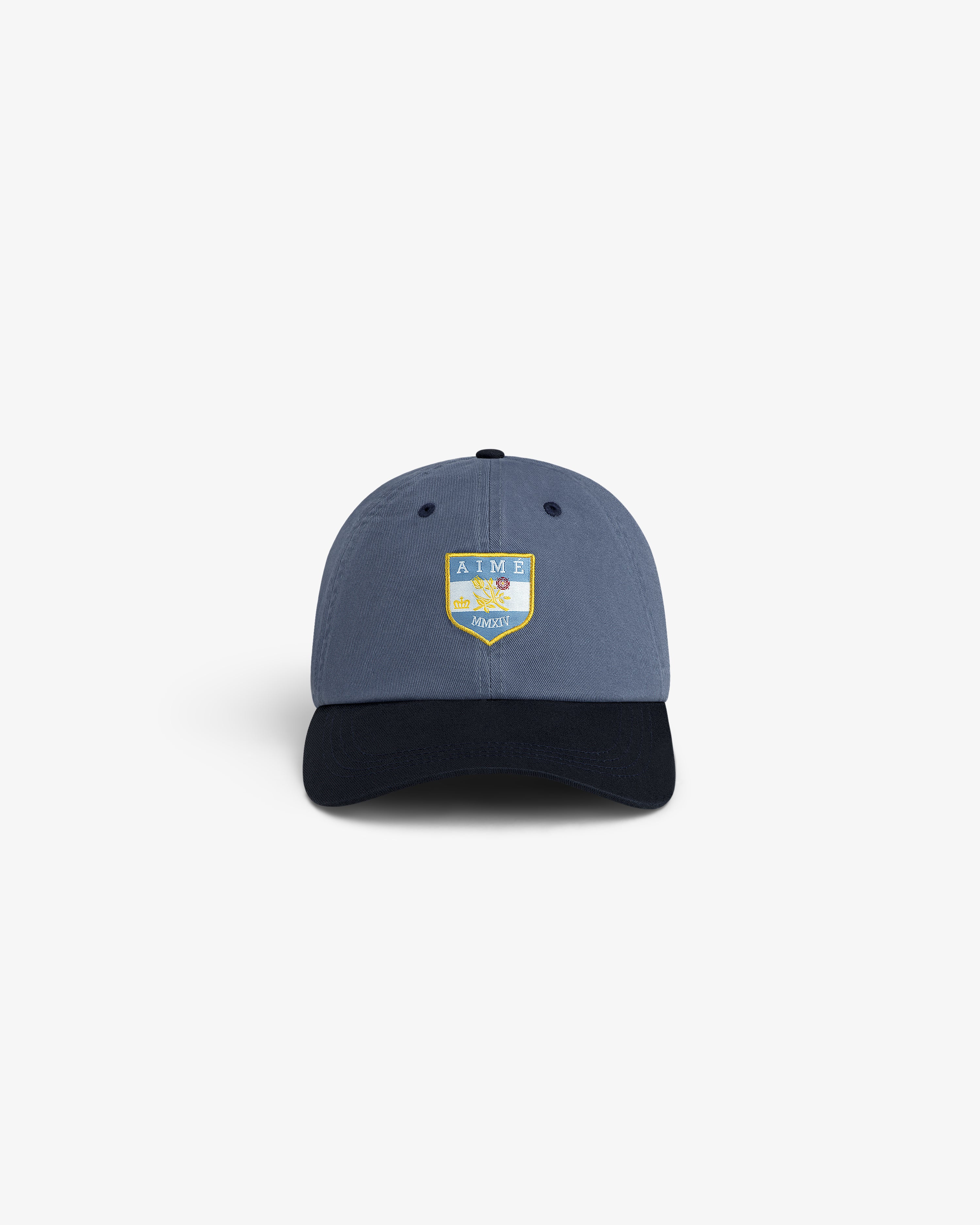 Crest Shield Hat: Blue cap with yellow and green AIME patch embroidered on the front.