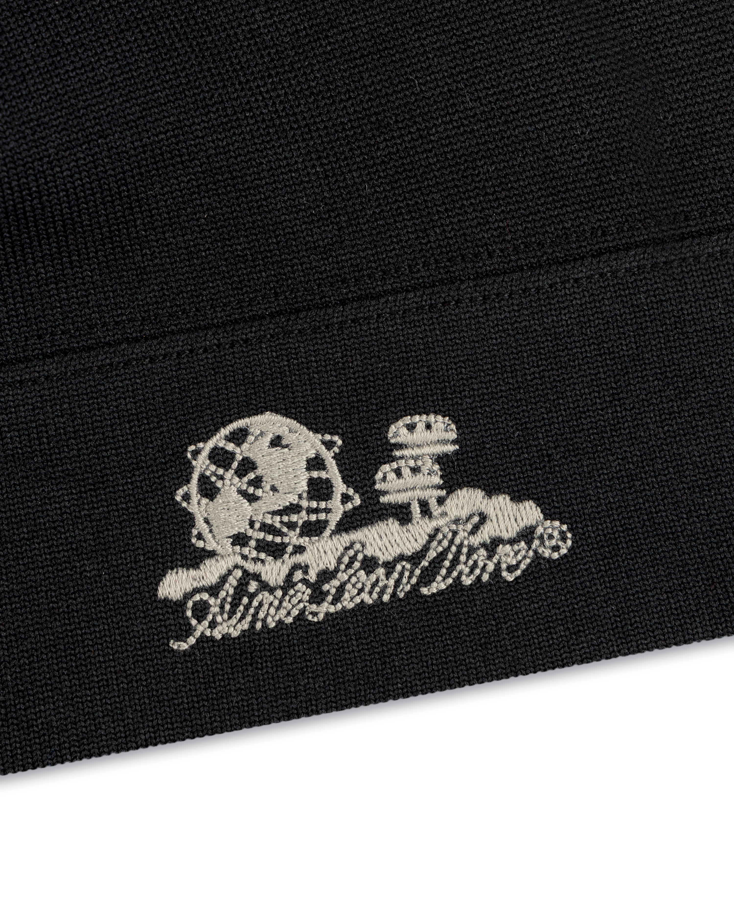 Unisphere Skull Cap: black fabric, white embroidered globe & mushrooms above stylized script.