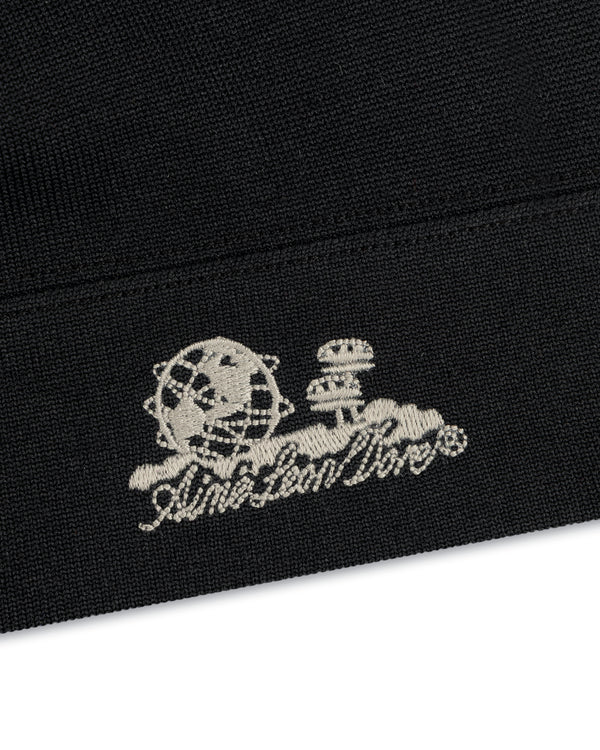 Unisphere Skull Cap: black fabric, white embroidered globe & mushrooms above stylized script.