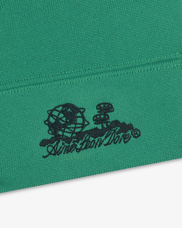 Green Unisphere Skull Cap with black embroidered globe, mushrooms, and “Anti Social Social Club” text below.