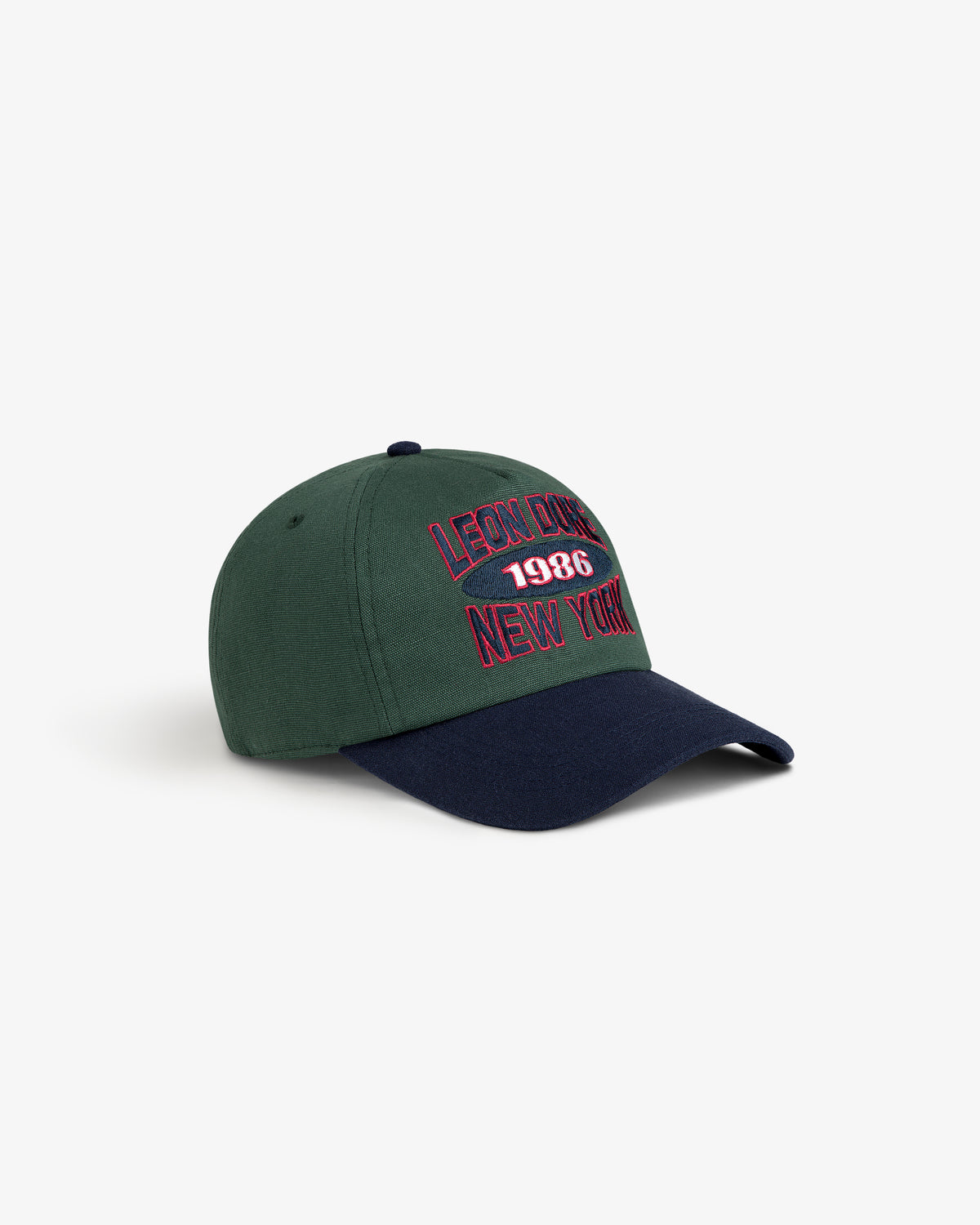 Colorblock Club Hat in green/navy with LEON DNM 1986 NEW YORK embroidered in red and white on the front.