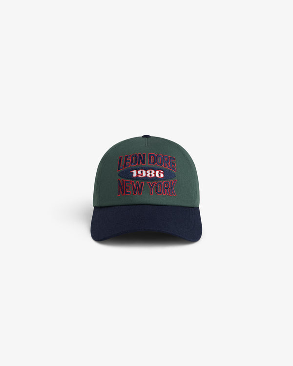 Colorblock Club Hat with LEON DORE 1986 NEW YORK embroidered on the front in red and white letters.