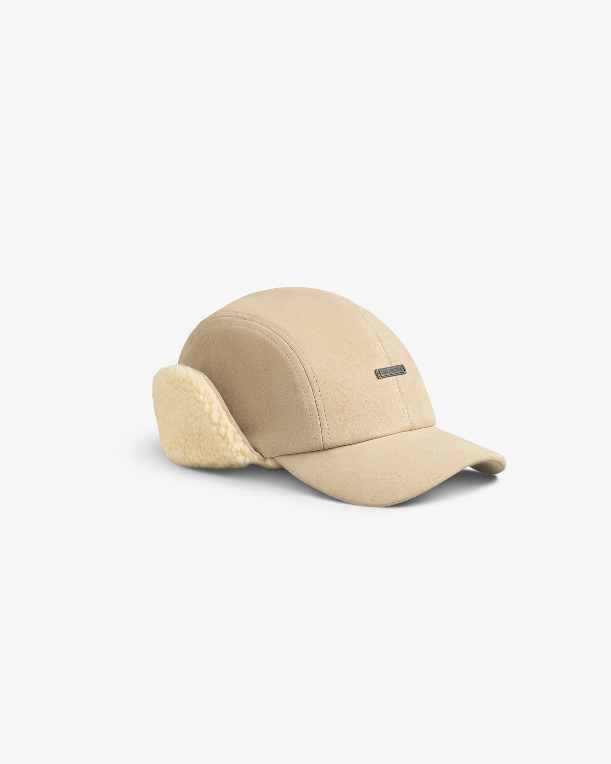 Tan Shearling Earflap Hat with fold-down earflaps lined with cream-colored fleece.