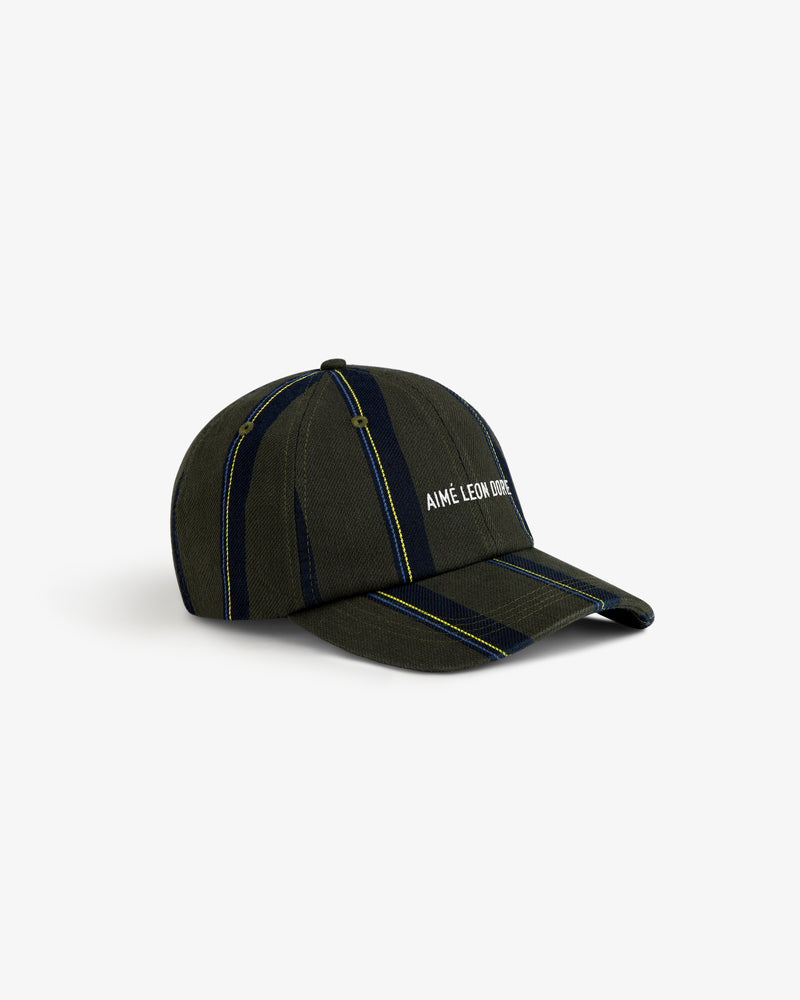 Striped Denim Logo Hat in green and navy with AIMÉ LEON DORE text embroidered on the front.
