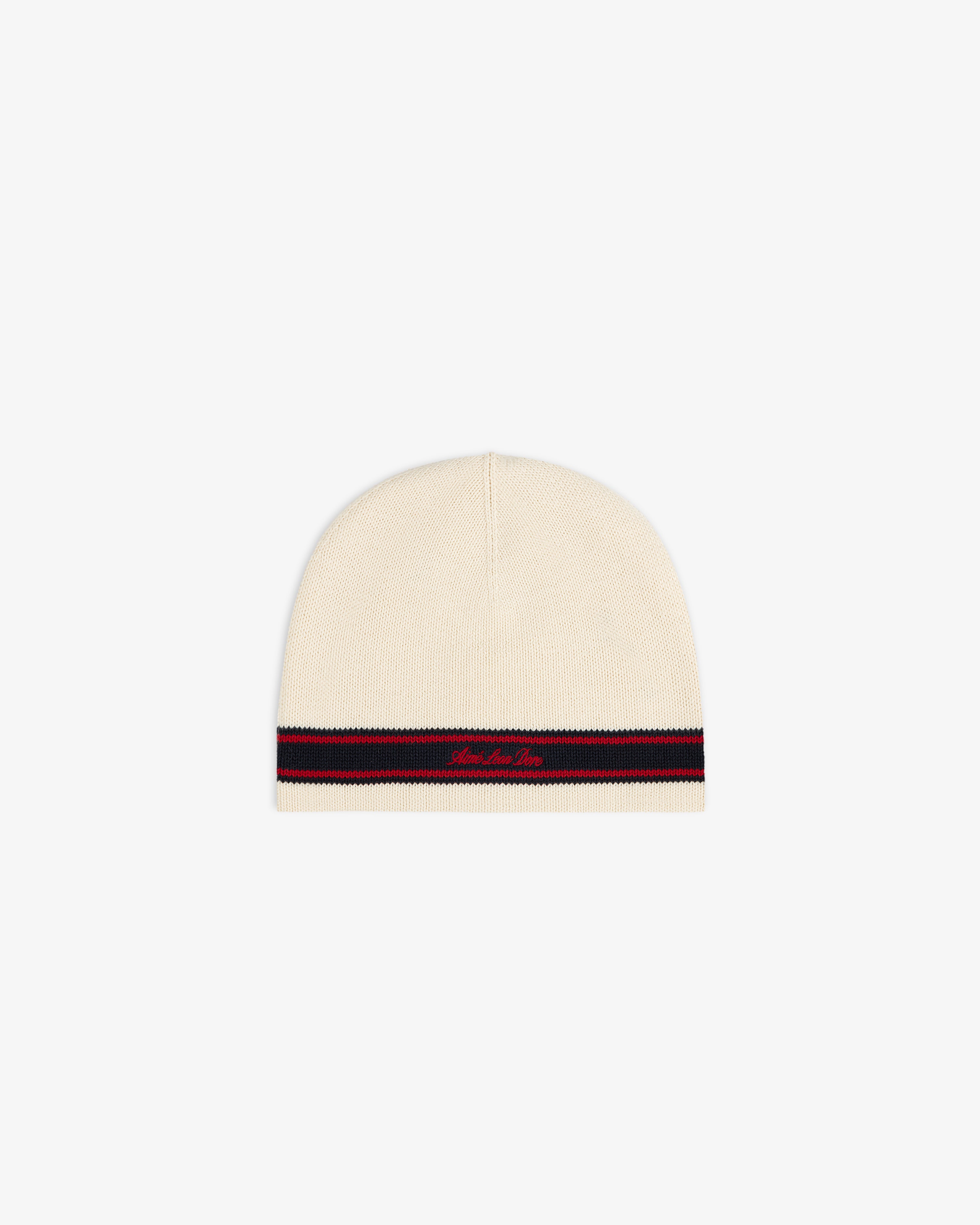 Stripe Knit Beanie: Cream knit with black and red stripe by hem, plus small red embroidered text.