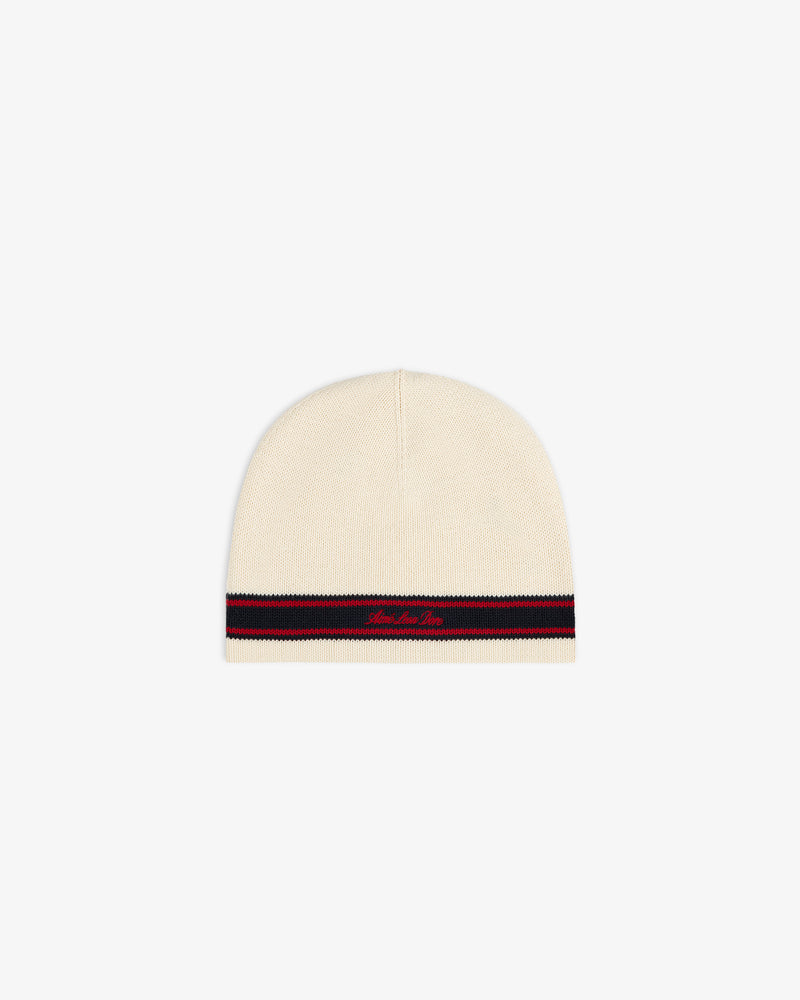 Stripe Knit Beanie: Cream knit with black and red stripe by hem, plus small red embroidered text.