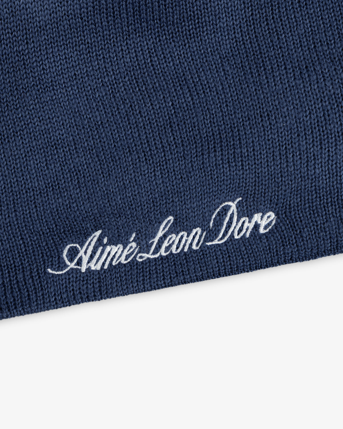 Navy blue ALD / New Era Dodgers Beanie with the brand name embroidered in white cursive script.