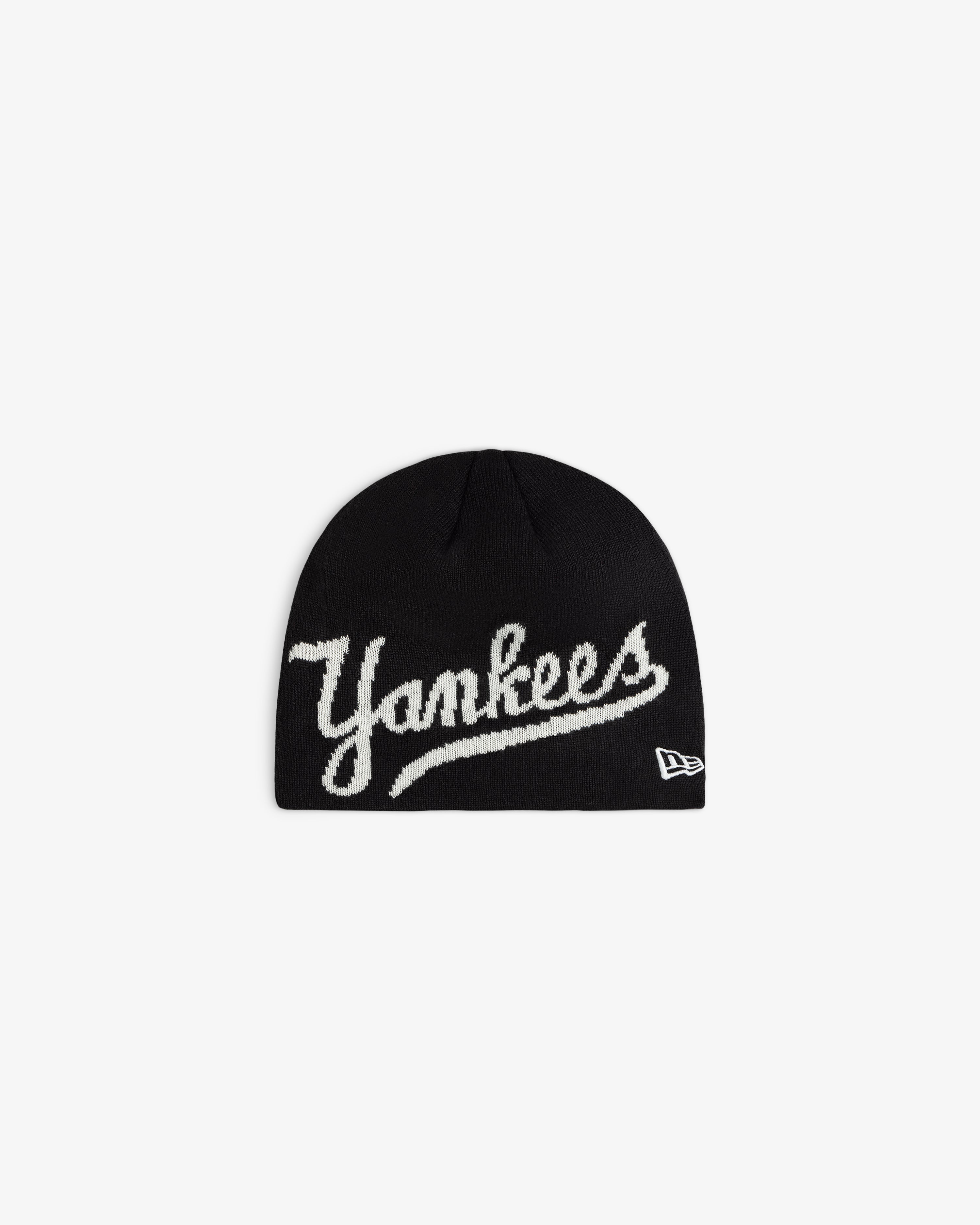 ALD / New Era Yankees Beanie in black knit with white script embroidery on the front.