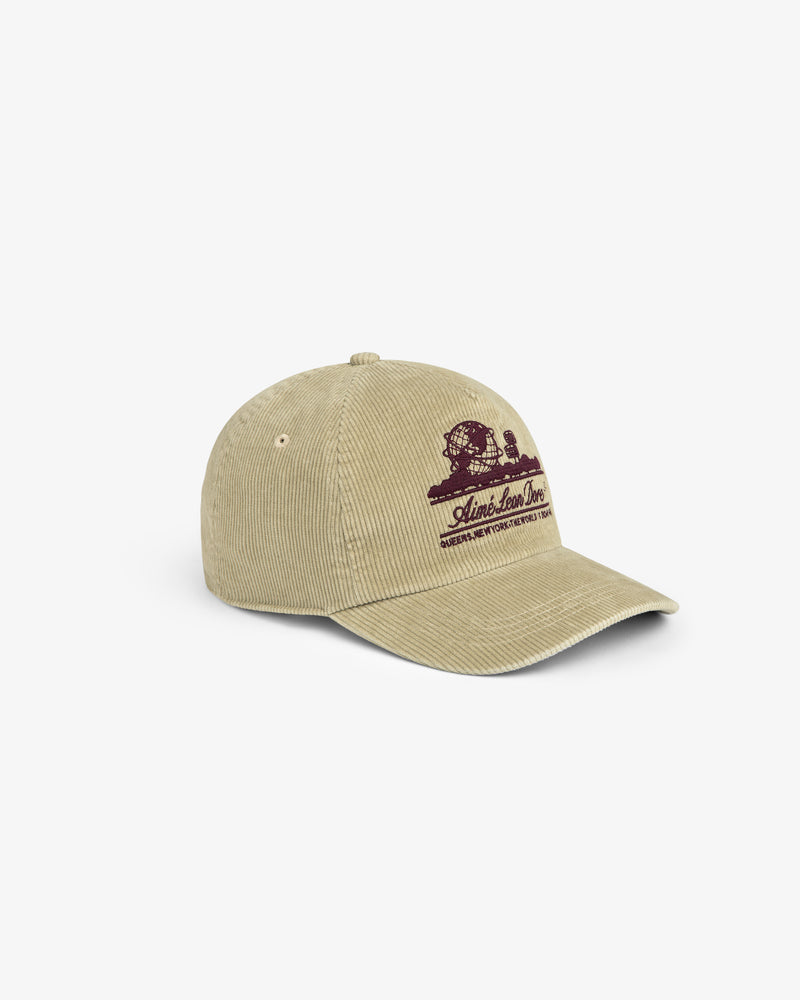 Beige corduroy Unisphere Hat with a maroon embroidered globe logo and text on the front.