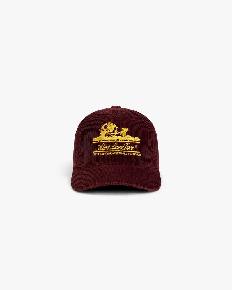 Burgundy Corduroy Unisphere Hat featuring an embroidered gold globe logo and text.