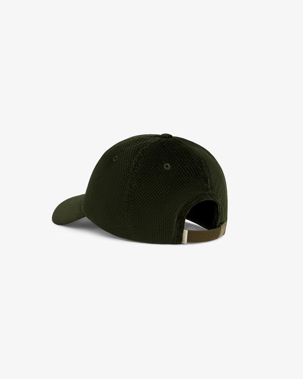 Saint George Corduroy Hat in dark green, shown from the back with curved brim and adjustable strap.