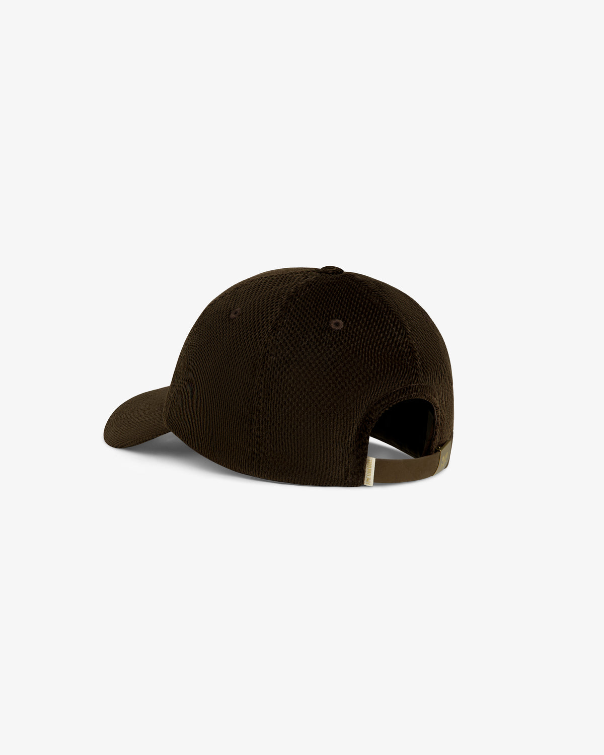 Saint George Corduroy Hat in brown, shown from the back with an adjustable strap and a curved visor.