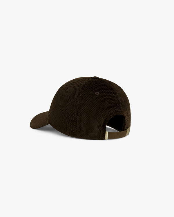 Saint George Corduroy Hat in brown, shown from the back with an adjustable strap and a curved visor.