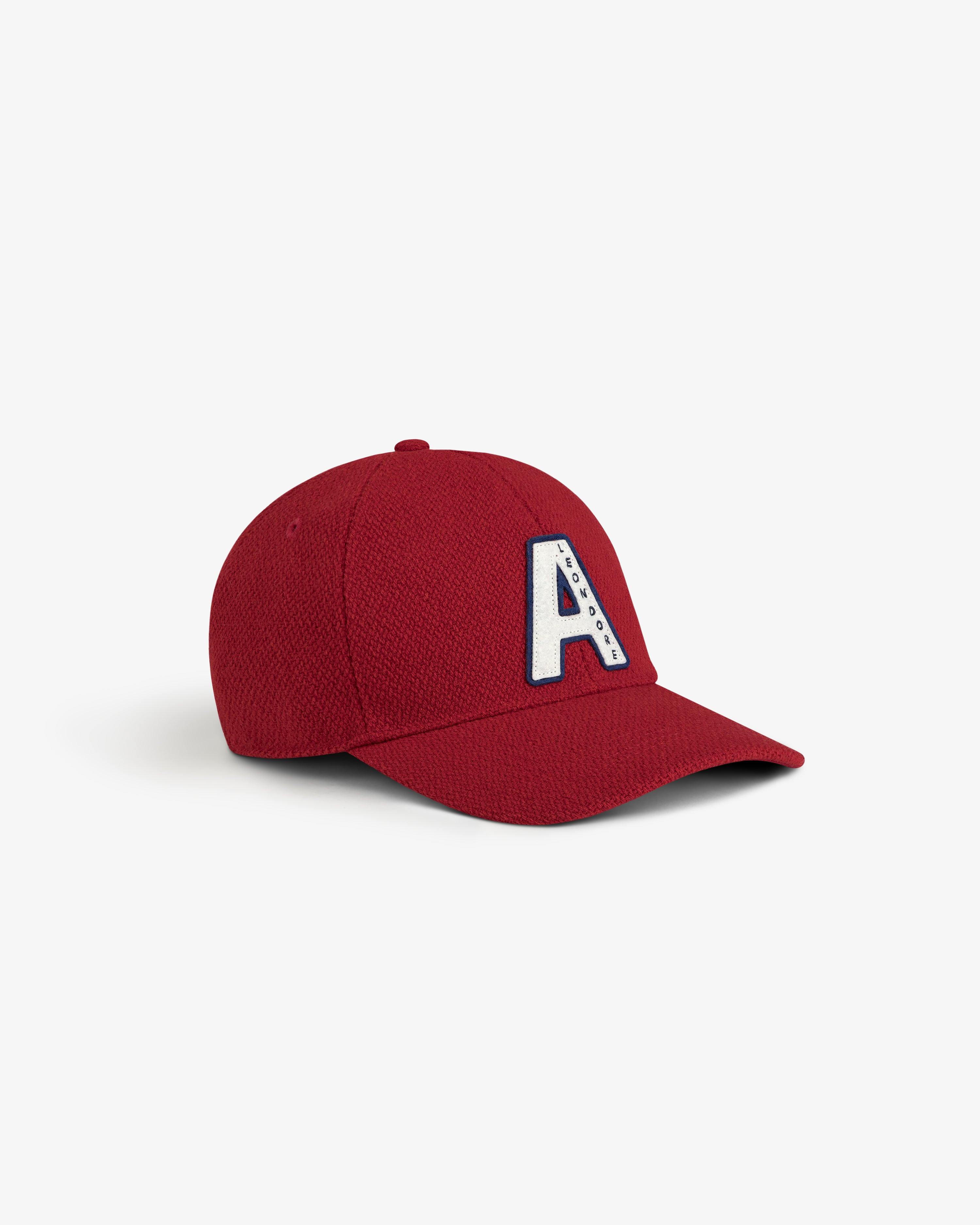 Wool Varsity Logo Hat in red with a white varsity-style letter A patch containing small blue text.