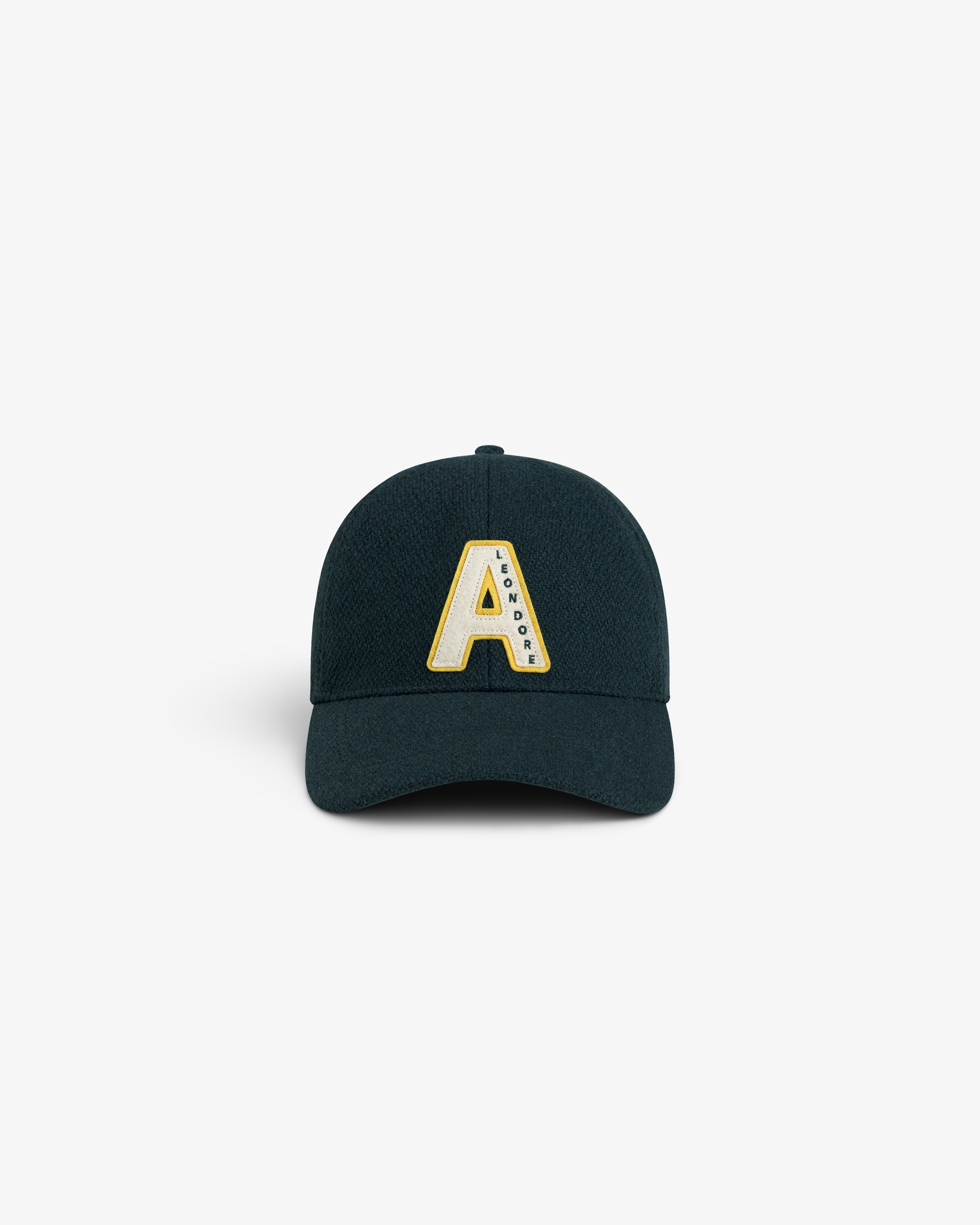Wool Varsity Logo Hat in dark green, featuring a cream and yellow letter A patch with small text on the right side.