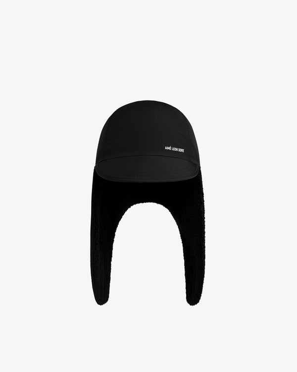 Black Fleece Lined Earflap Hat with earflaps and white text on the side.