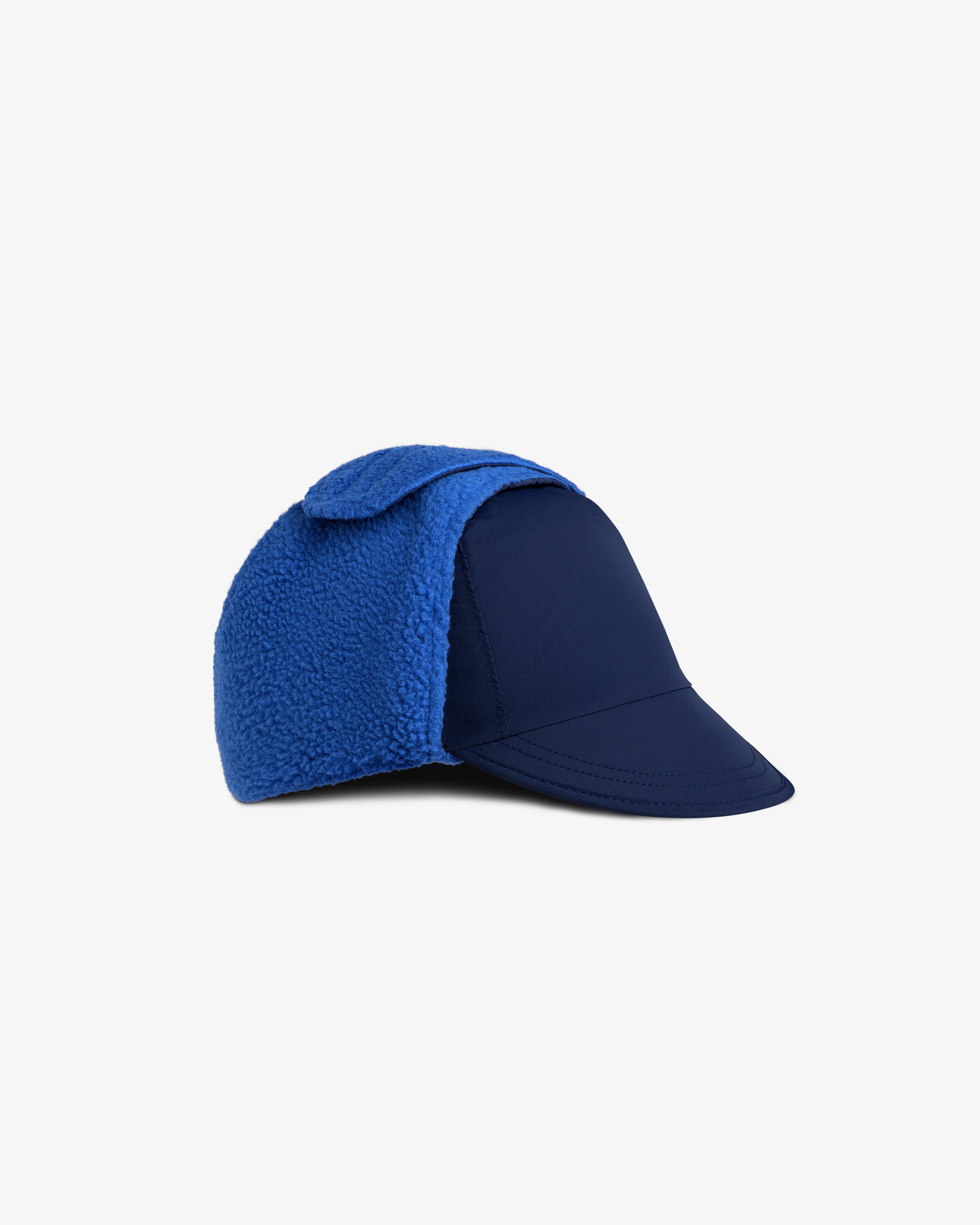 Fleece Lined Earflap Hat in navy blue with bright blue fleece earflaps.