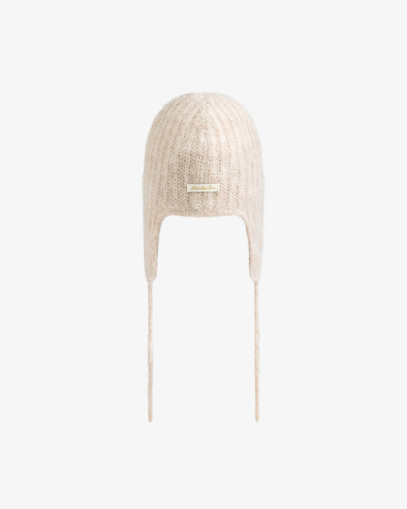 Beige ribbed Alpaca Wool Knit Earflap Hat with long side ties and a small brand tag on the front.