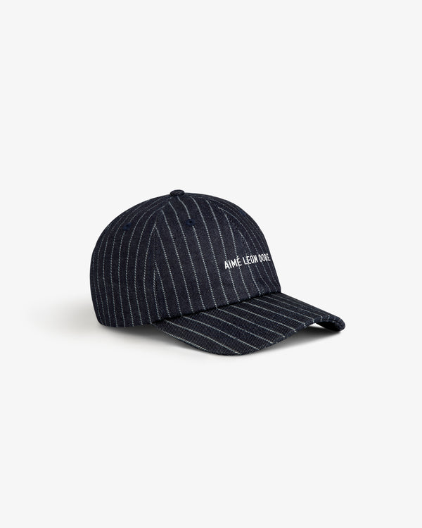 Chalk Stripe Logo Hat in navy with white AIMÉ LEON DORE text, displayed on a white background.