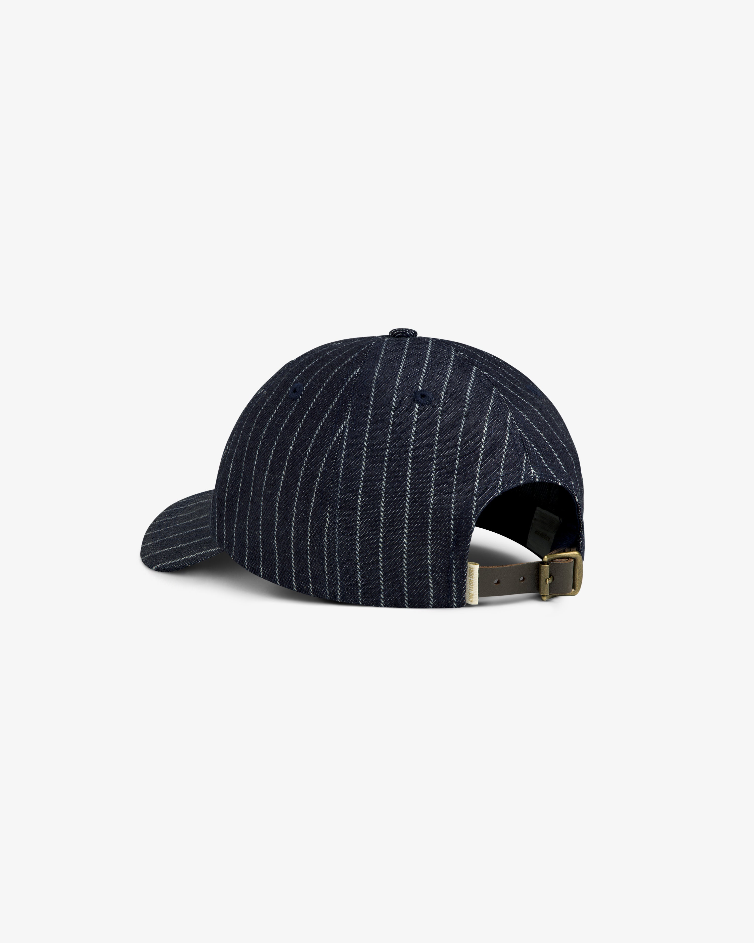 Chalk Stripe Logo Hat in navy blue shown from the back with adjustable strap and metal buckle.