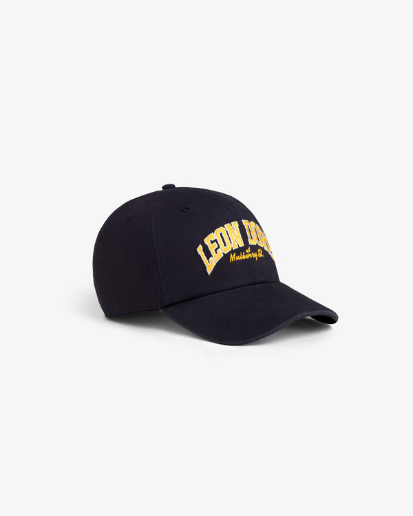 Mulberry Letterman Hat: Navy baseball cap with yellow “LEON DORE” embroidery on the front.