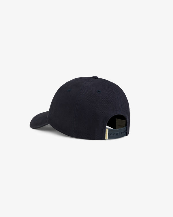 Mulberry Letterman Hat in navy blue, shown from the back with an adjustable strap and curved brim.