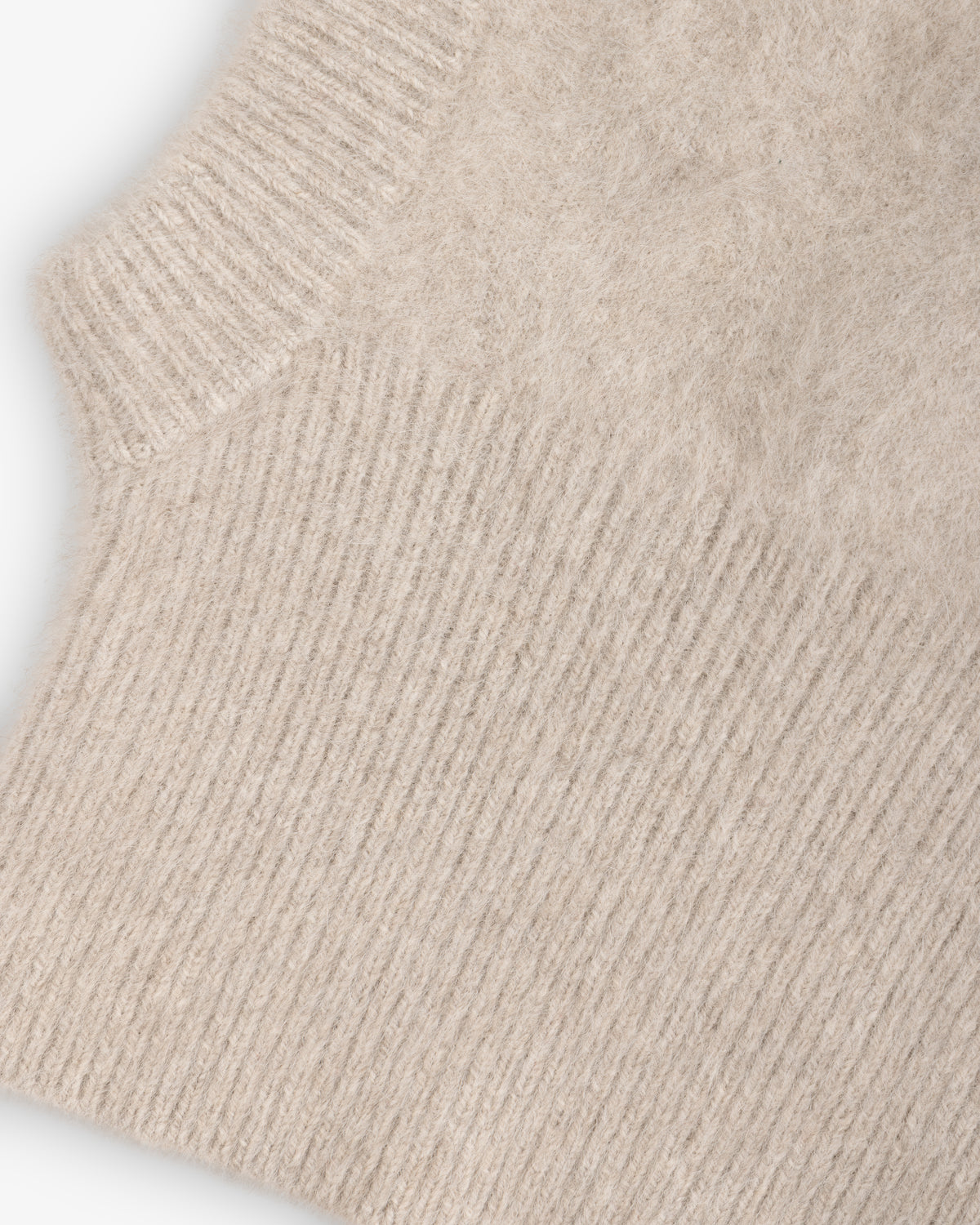 Beige fuzzy knit Fox Fur Hood with a ribbed collar.