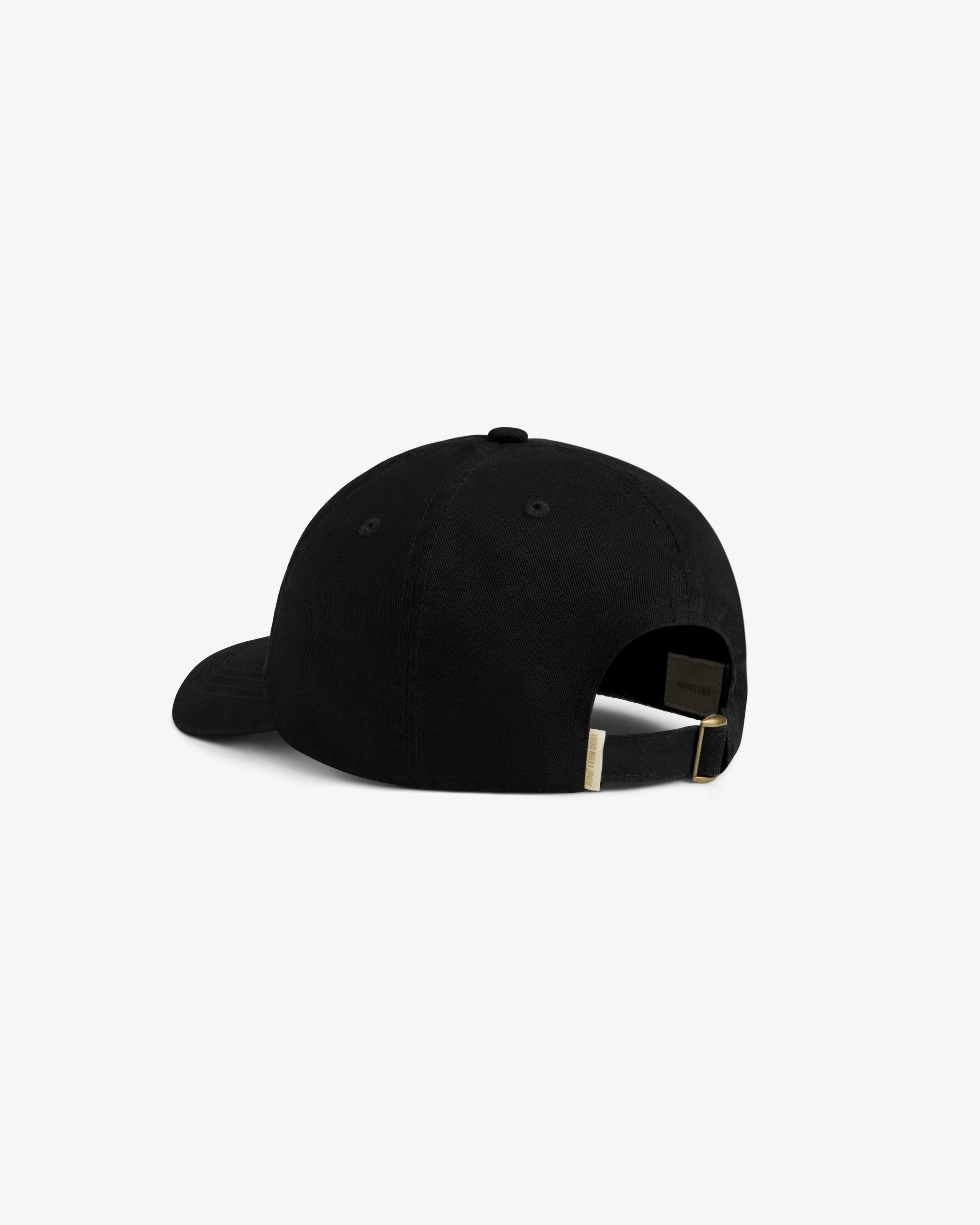 The Stacked Logo Hat in black, shown from the back with an adjustable strap and metal clasp.
