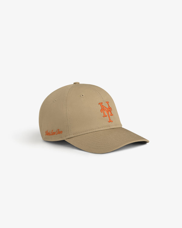 ALD / New Era Mets Ballpark Hat in beige with orange NY logo and script, displayed on a white background.