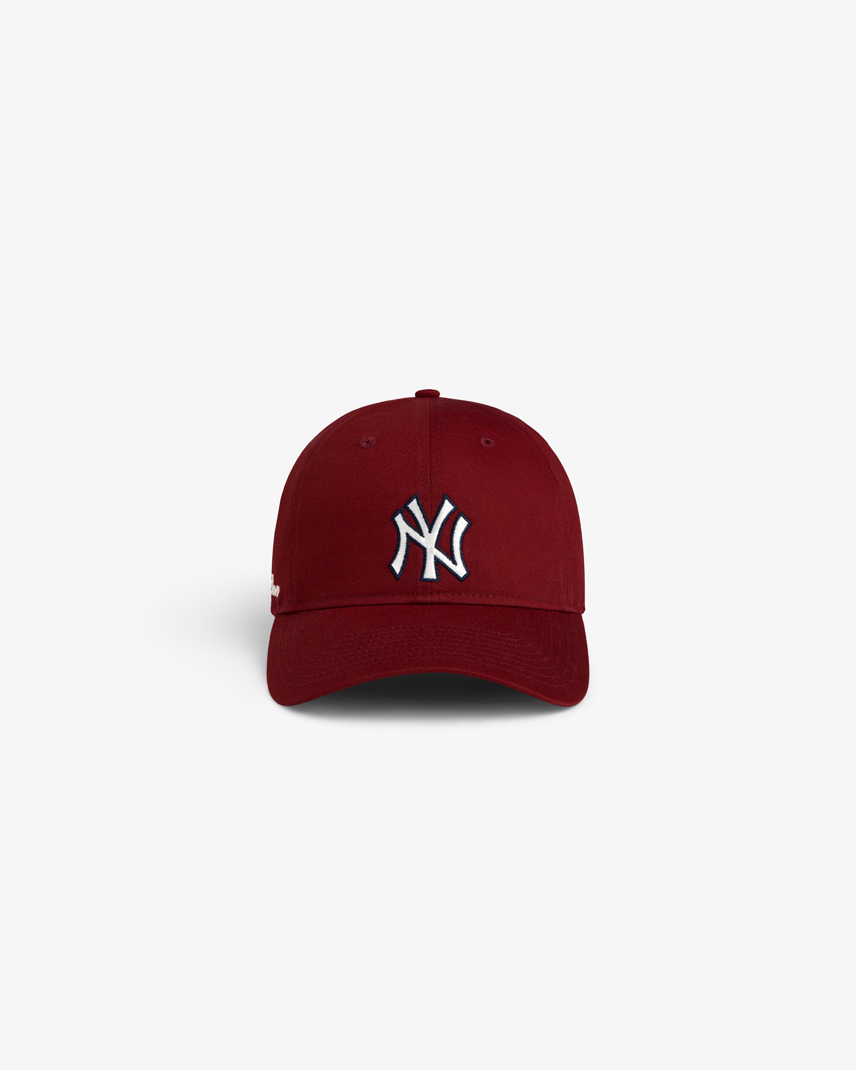 The ALD / New Era Yankees Ballpark Hat in maroon with a white NY logo, displayed on a white background.