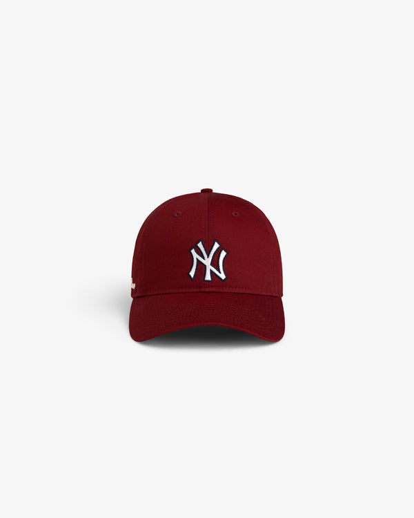 The ALD / New Era Yankees Ballpark Hat in maroon with a white NY logo, displayed on a white background.