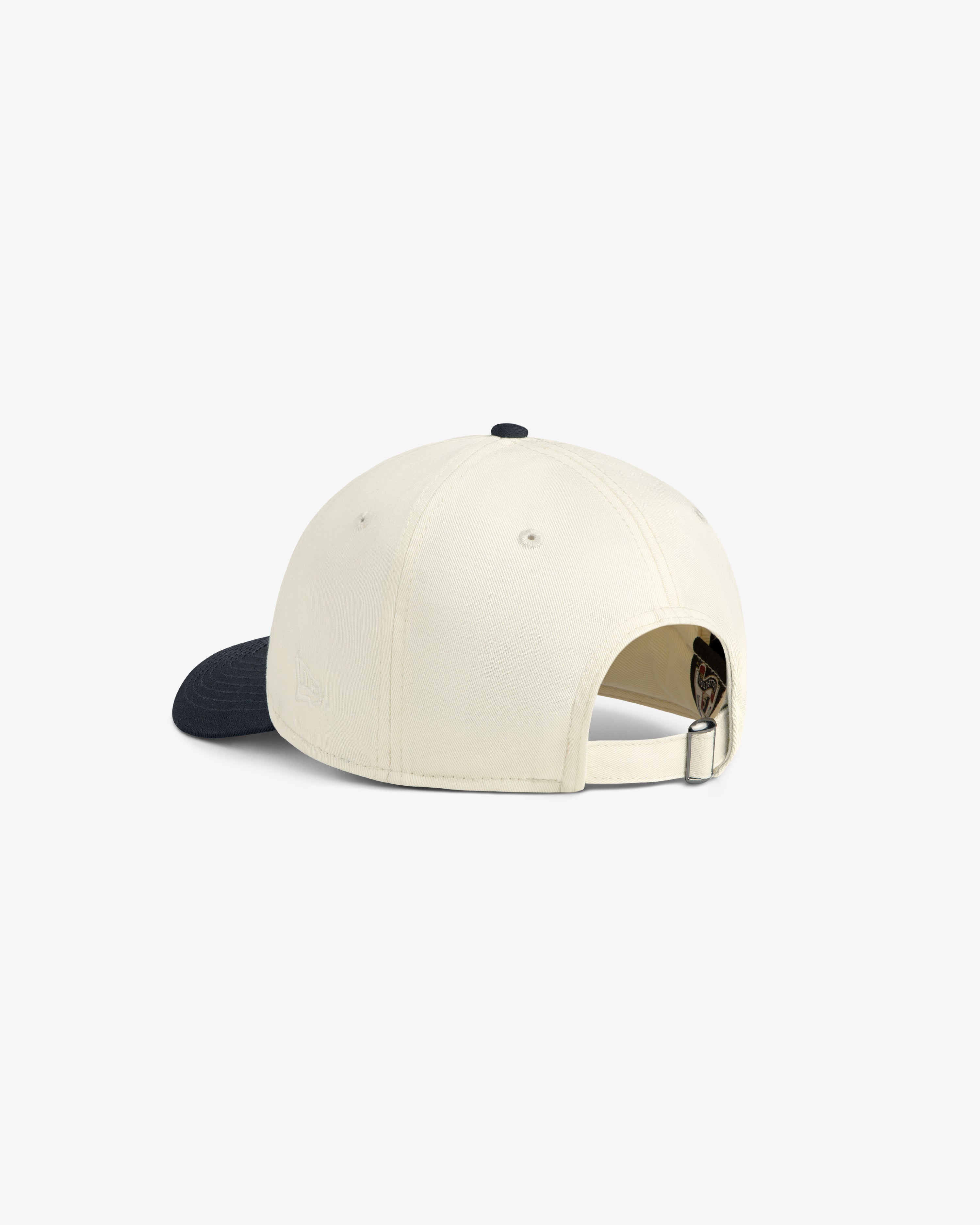 ALD / New Era Yankees Ballpark Hat in cream with black brim, back view shows adjustable strap and metal buckle.