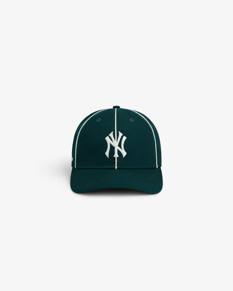 ALD / New Era Yankees Wool Hat in dark green with a white team logo and white pinstripe details.