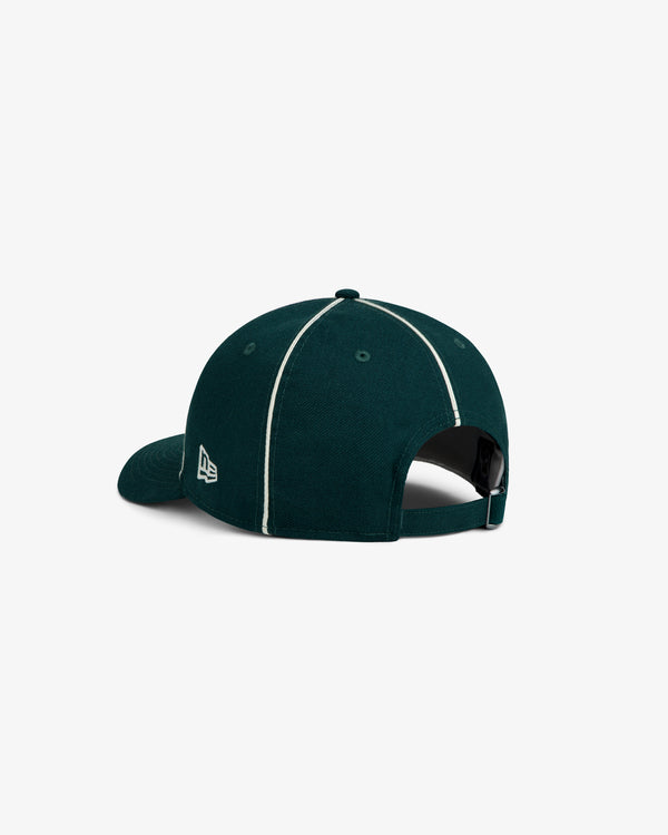 ALD / New Era Mets Wool Hat in dark green with white piping and an adjustable strap back.