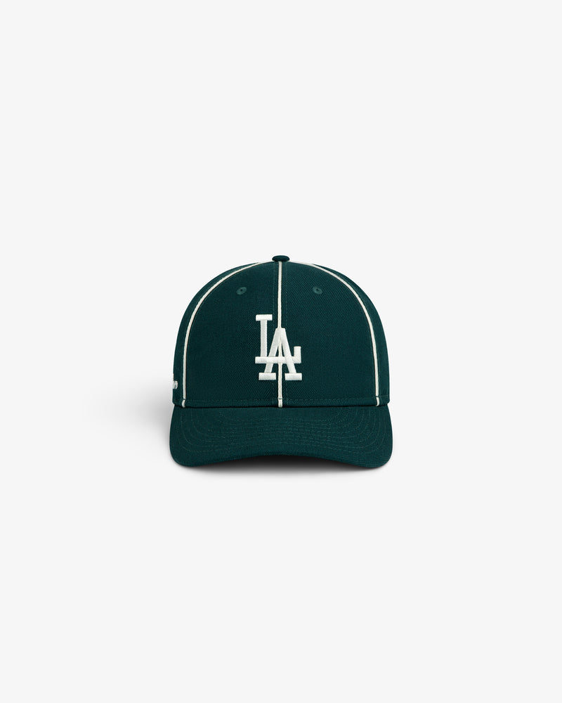 ALD / New Era Dodgers Wool Hat in dark green with white piping and a white LA logo on the front.
