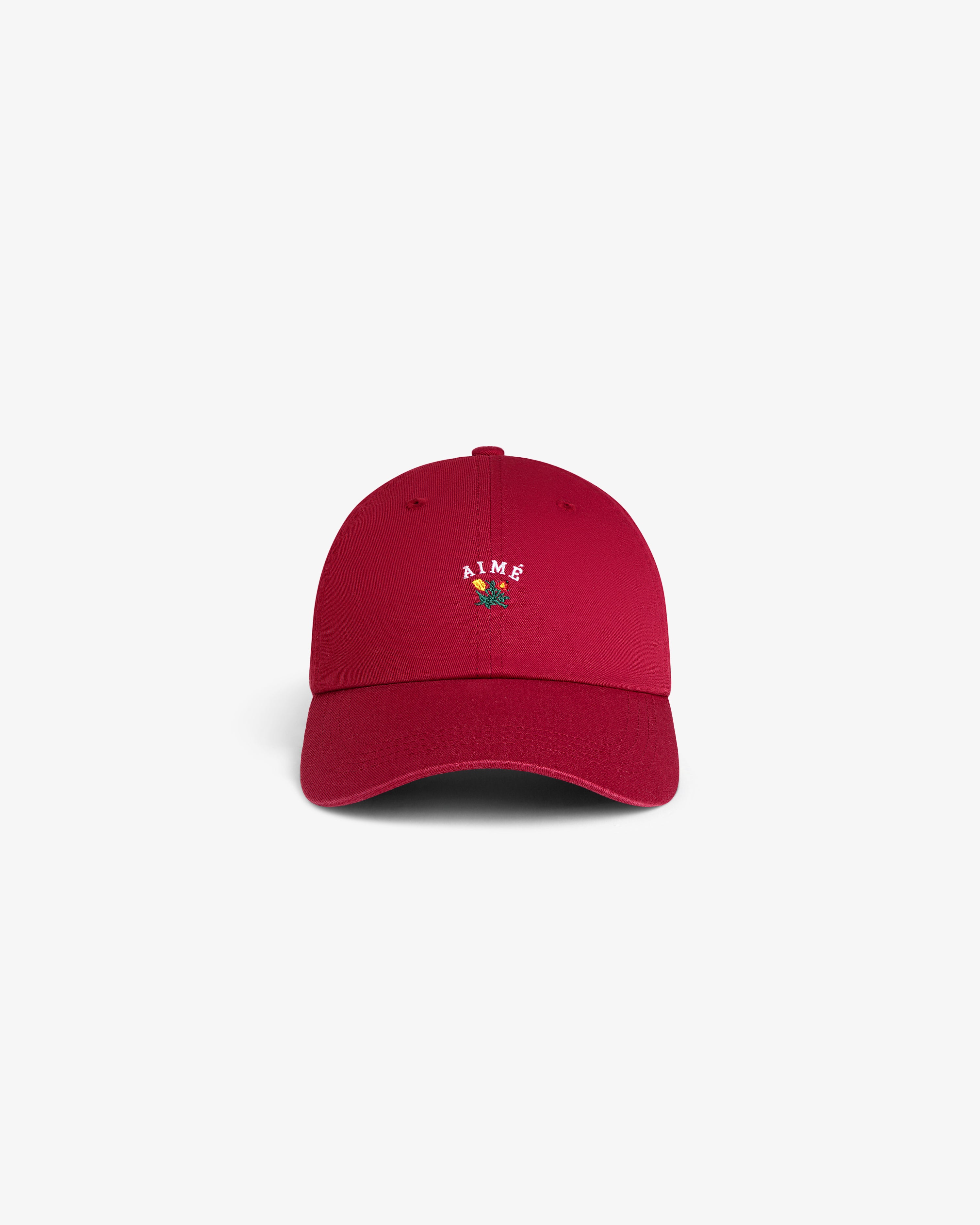 Red Crest Logo Hat featuring small AIME text and a front rose embroidery, shown on a plain white background.
