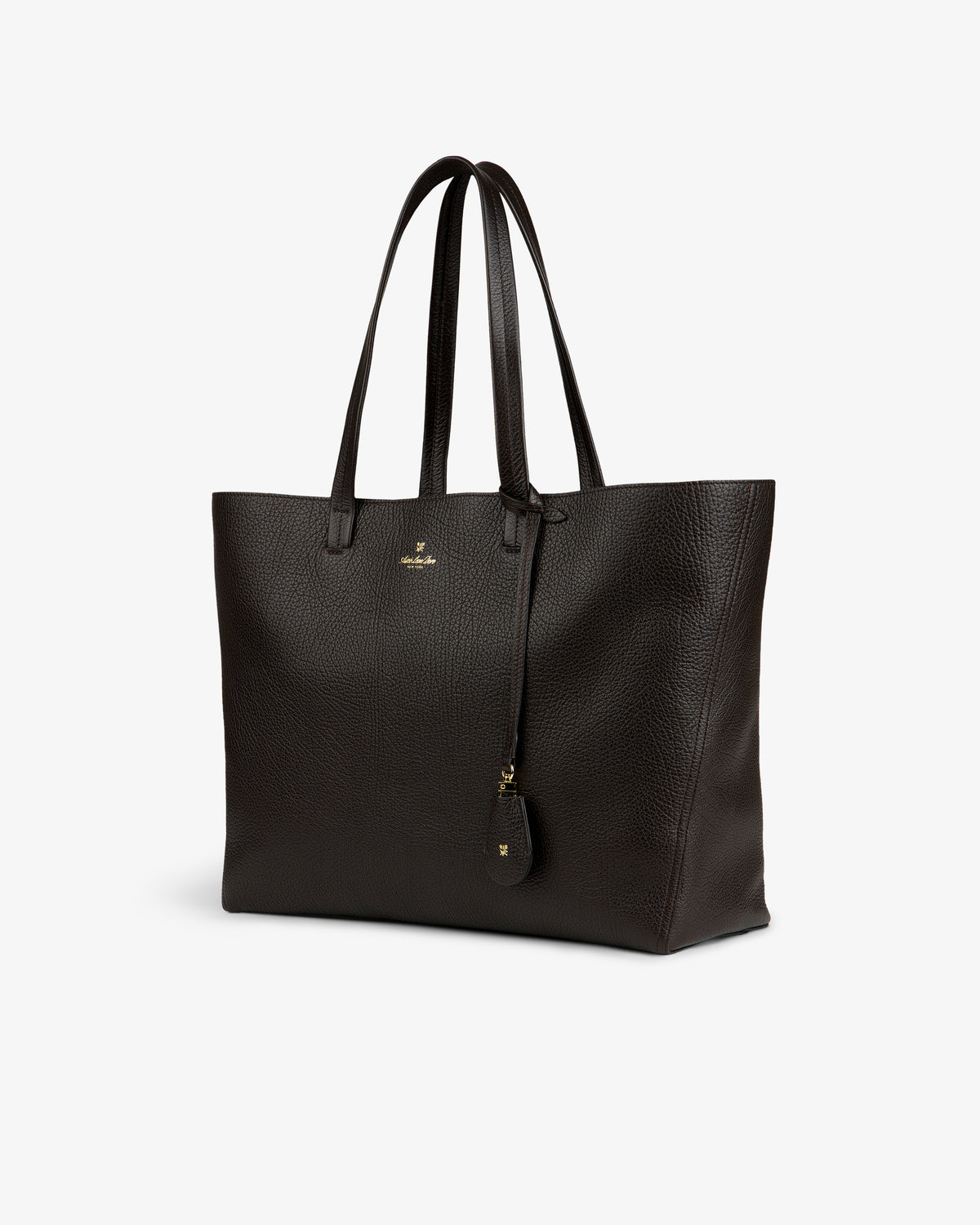 Tumbled Leather Tote Bag in dark brown with two handles and a hanging tag, shown on a plain white background.