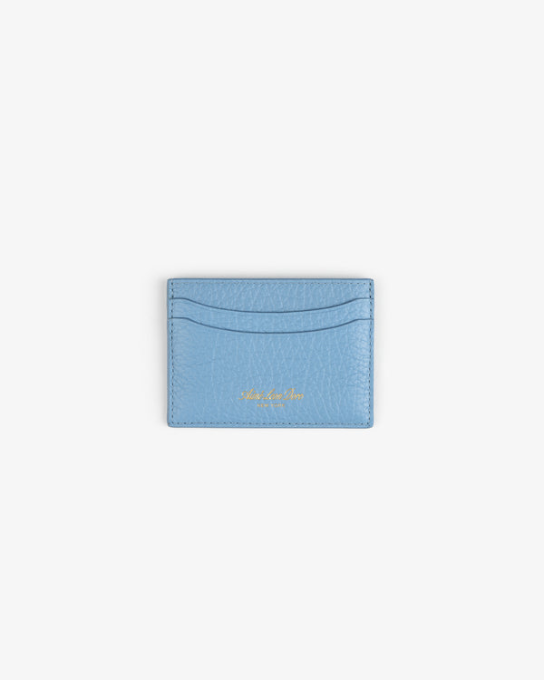 Tumbled Leather Card Holder in light blue with gold embossing, displayed on a plain white background.
