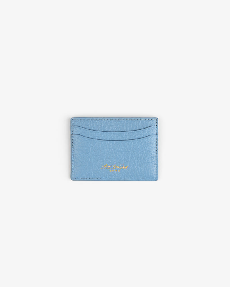 Tumbled Leather Card Holder in light blue with gold embossing, displayed on a plain white background.