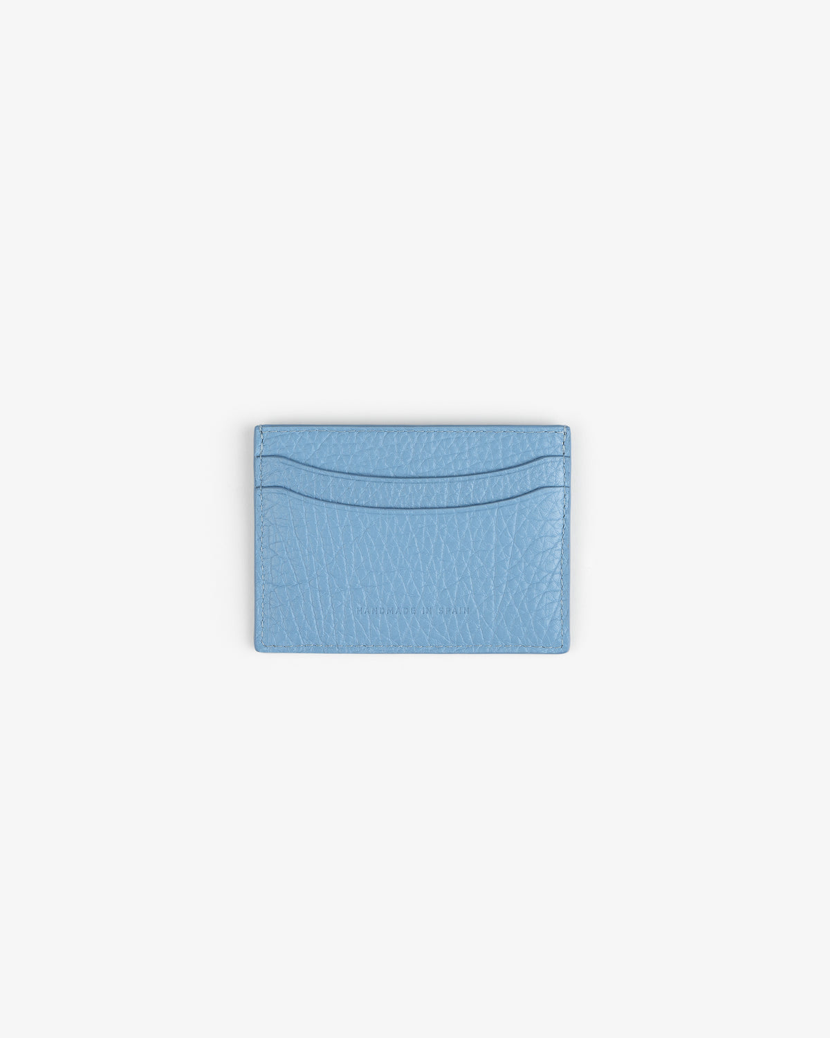 Tumbled Leather Card Holder in light blue with two slots, shown on a plain white background.