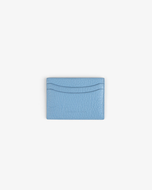 Tumbled Leather Card Holder in light blue with two slots, shown on a plain white background.