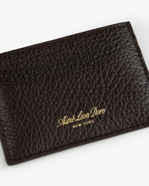 Tumbled Leather Card Holder in textured dark brown leather with Aimé Leon Dore New York gold lettering.