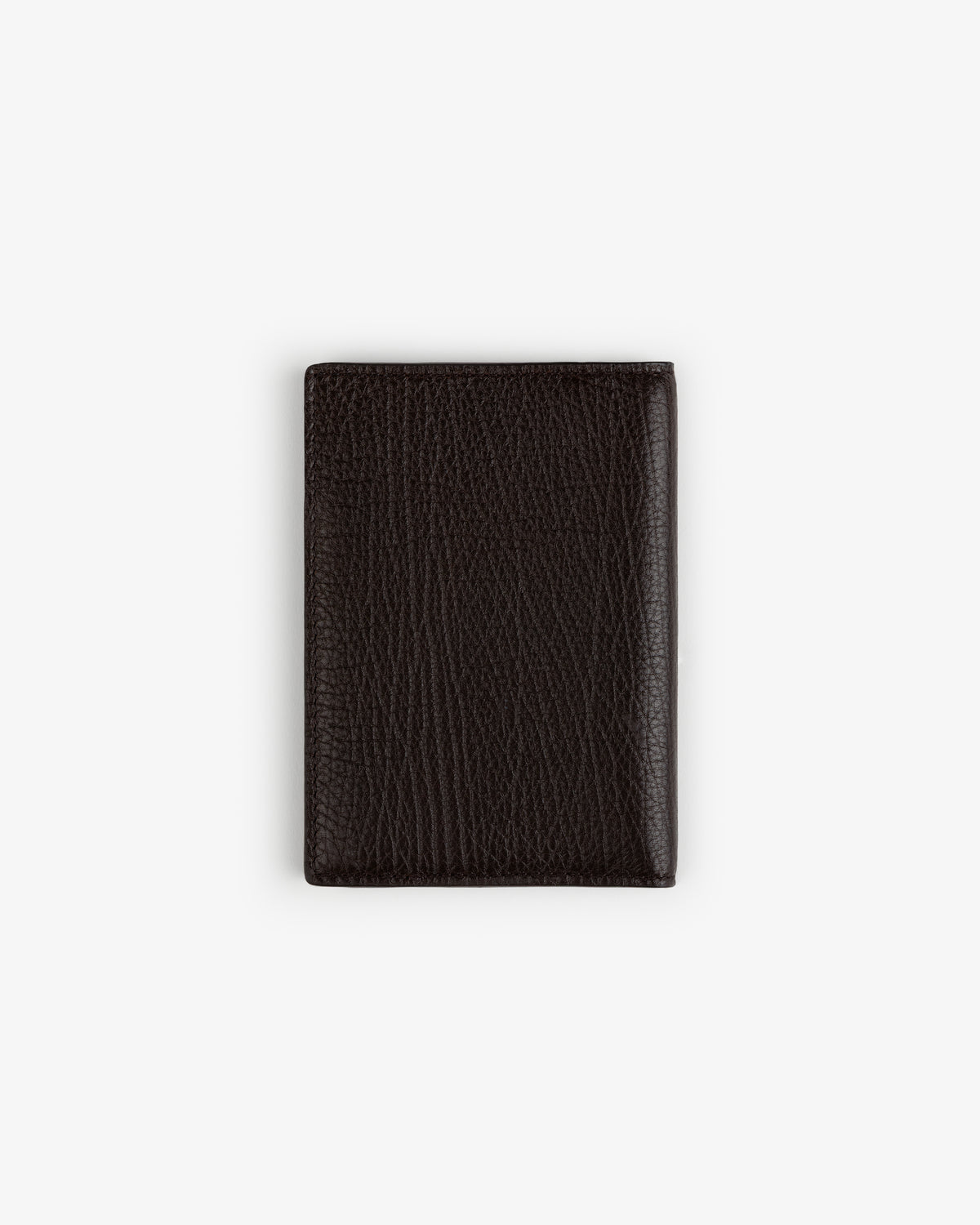 Tumbled Leather Passport Holder in dark brown, closed and upright on a plain white background.