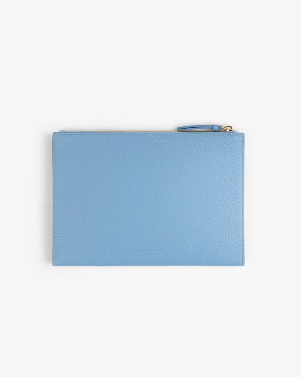 Small Tumbled Leather Pouch in light blue, rectangular with a zipper, shown against a plain white background.