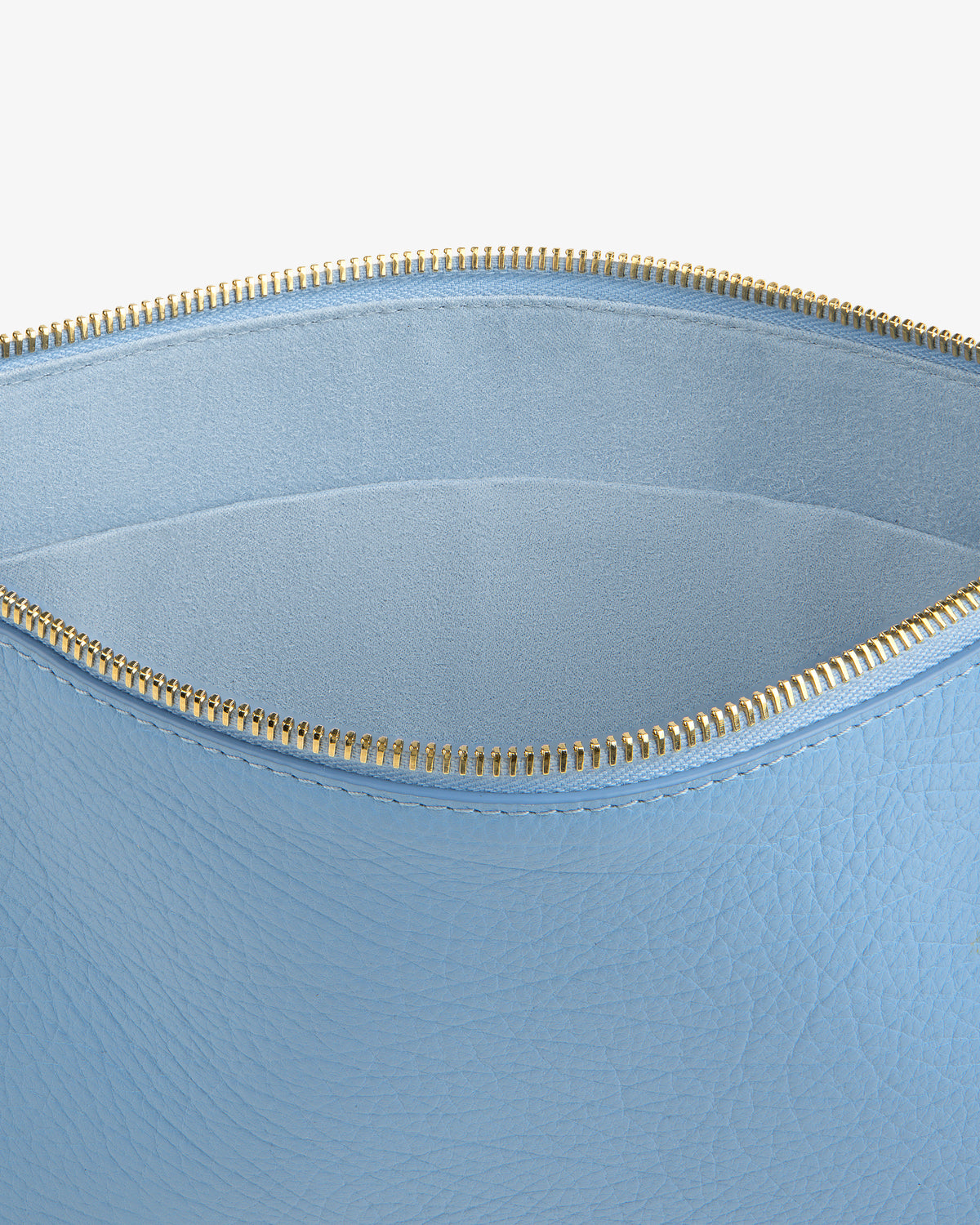 Small Tumbled Leather Pouch in light blue with gold zipper, viewed from above on a white background.