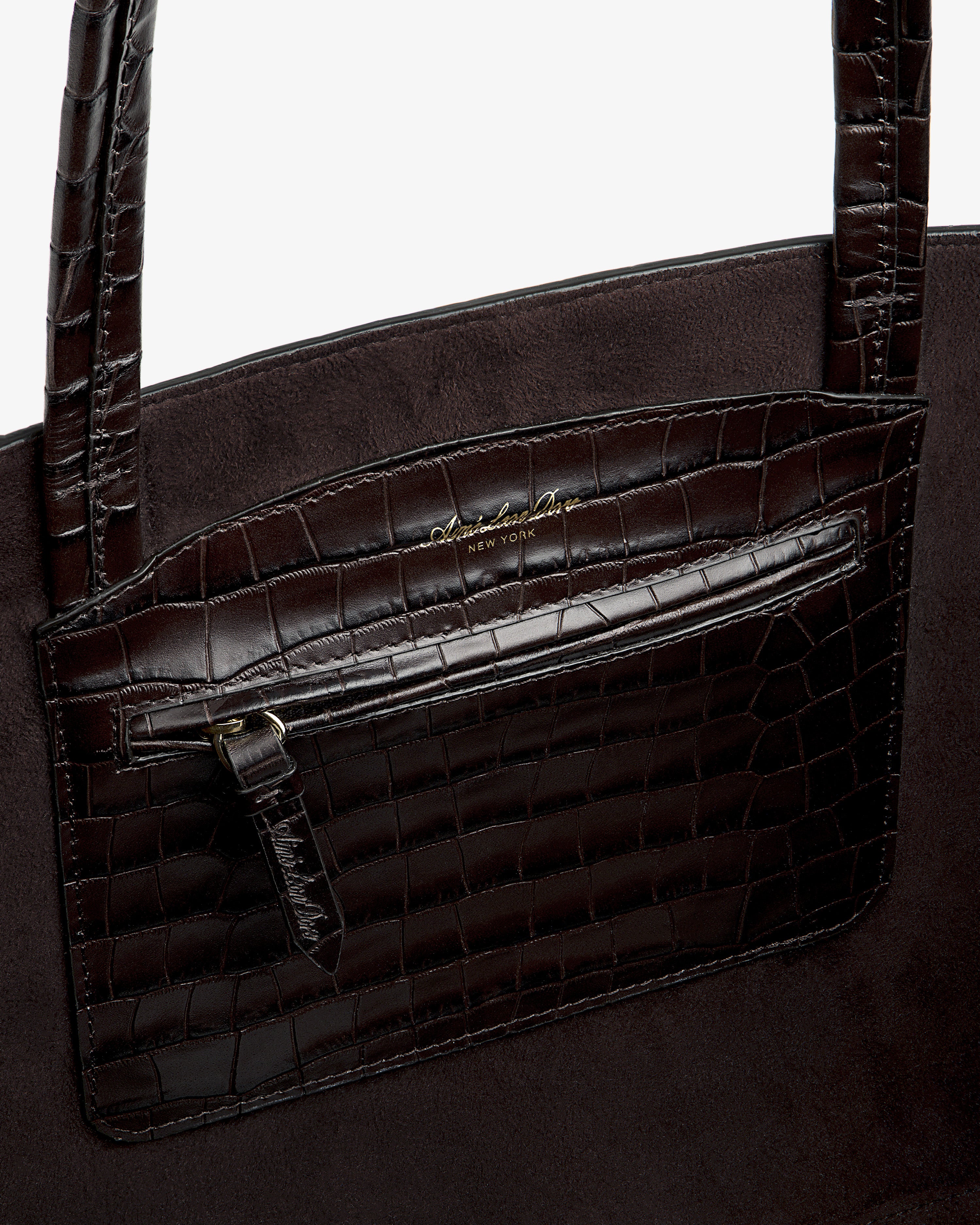 Interior of a dark brown Croc-Embossed Leather Shoulder Bag featuring a zippered pocket.